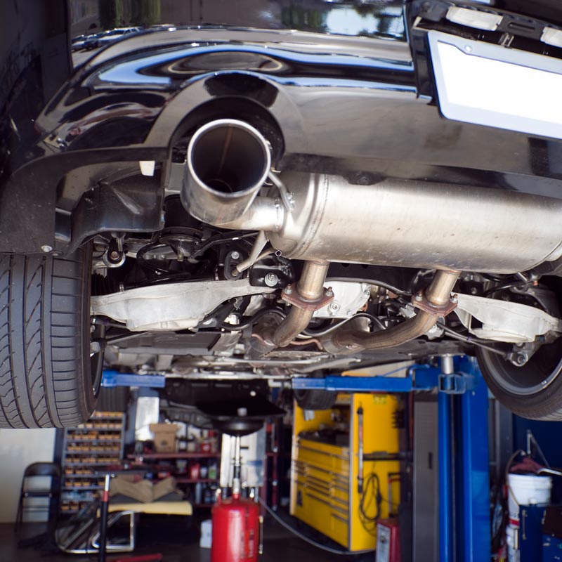 car lifted and showing underbody